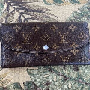 Louis Vuitton Brown Monogram with red interior Sarah wallet